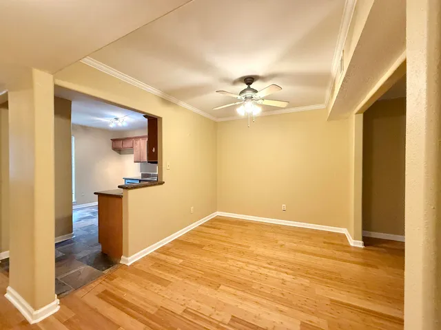 a view of an empty room and window