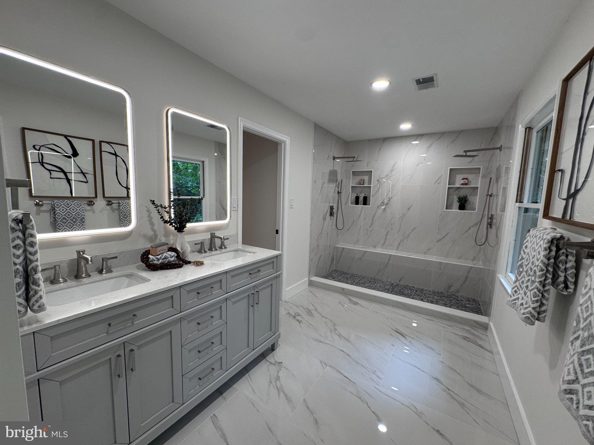 1132 Springvale Road Great Falls, VA 22066 - Photo 17 of 18 Sleek modern bathroom with elegant finishes.