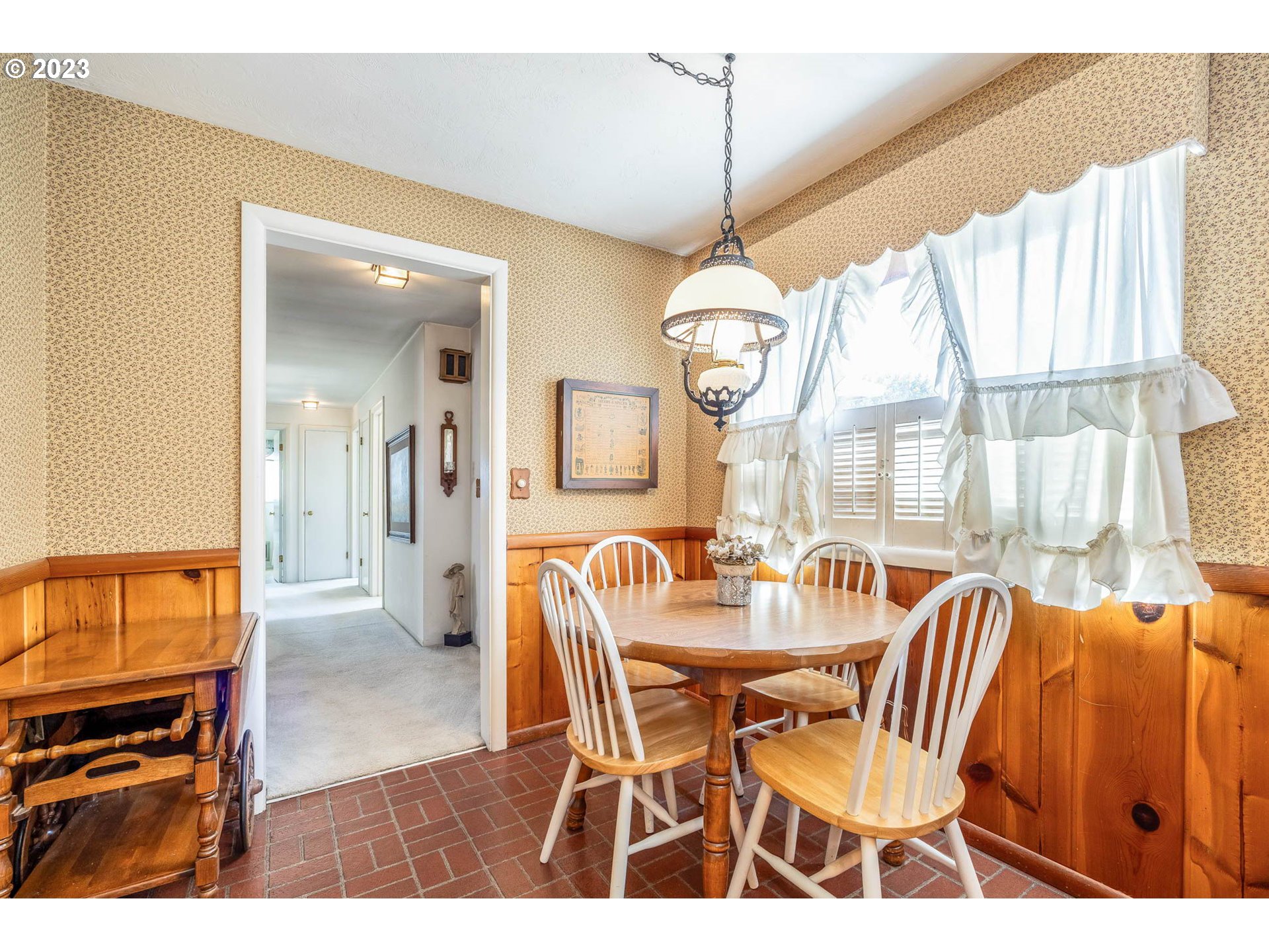 2735 Country Lane Eugene, OR 97401 - Photo 16 of 31 a view of a dining room with furniture window and wooden floor