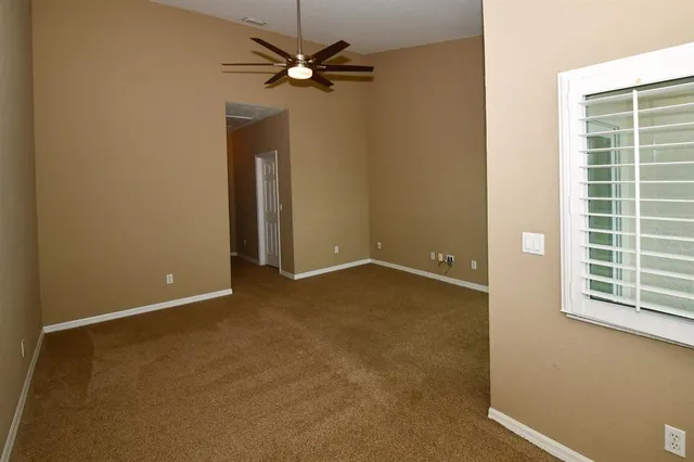 a bathroom with a shower and a toilet