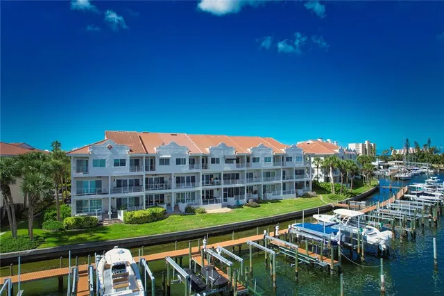 a front view of a house with a yard table and chairs