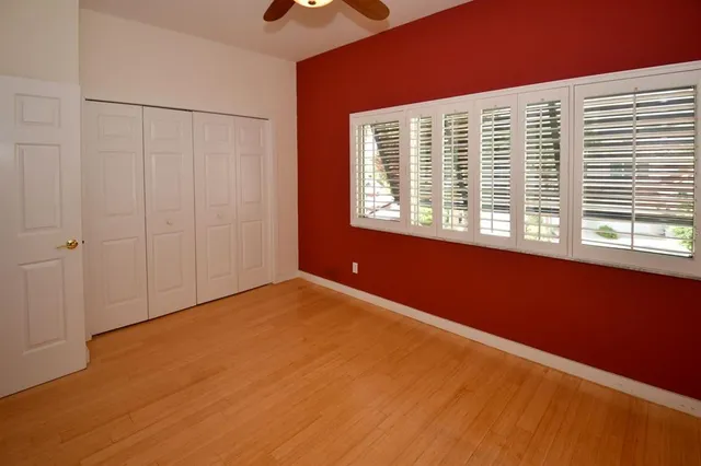 a front view of a house with a yard table and chairs