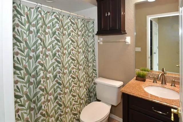 a view of a lake with a houses