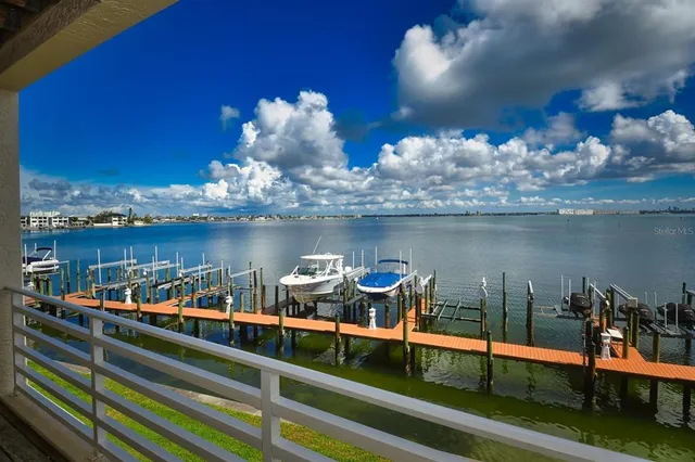 a view of a lake from a balcony