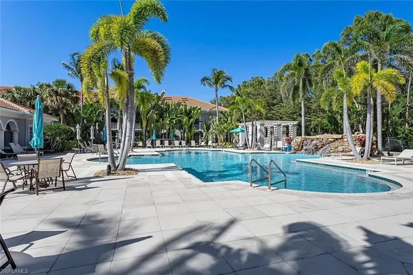 a view of a swimming pool with a patio