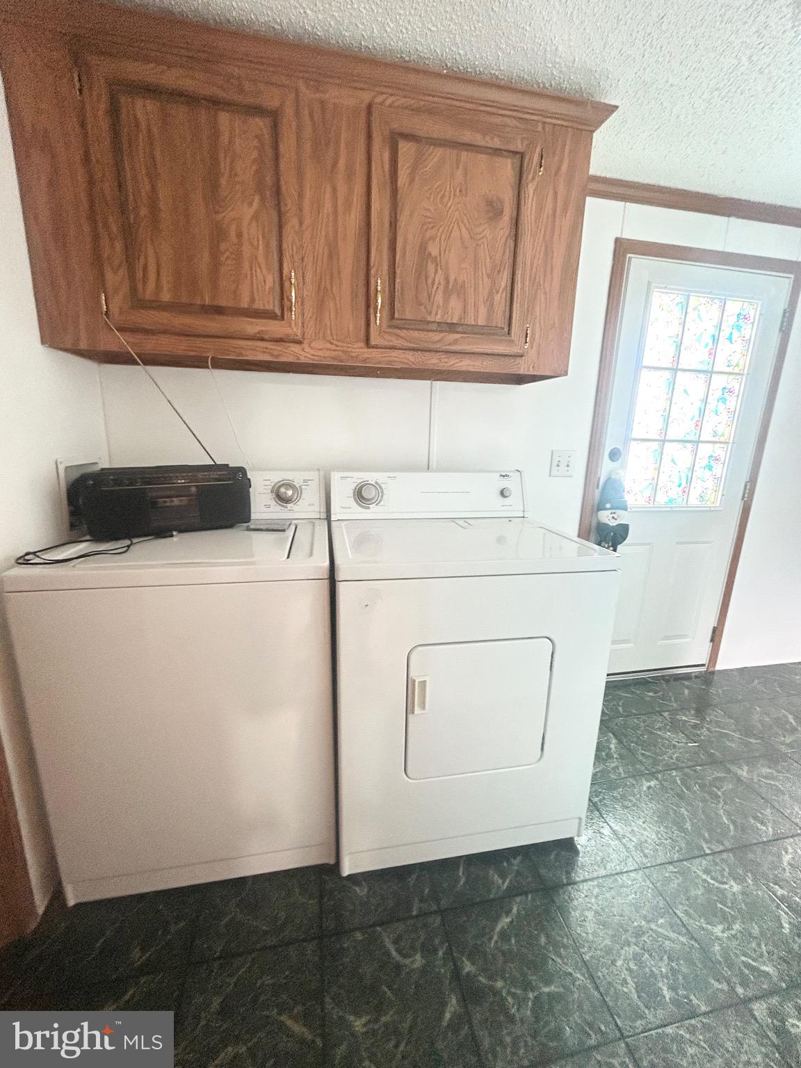 1079 Sage Avenue Reading, PA 19605 - Photo 12 of 12 a utility room with dryer and washer