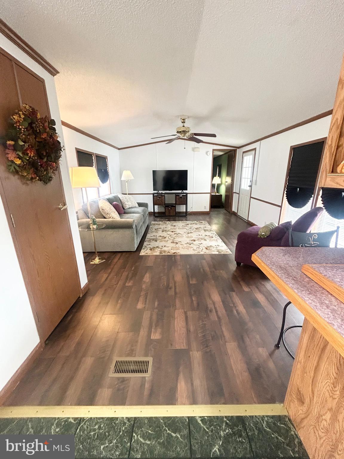 1079 Sage Avenue Reading, PA 19605 - Photo 4 of 12 a living room with furniture and a flat screen tv