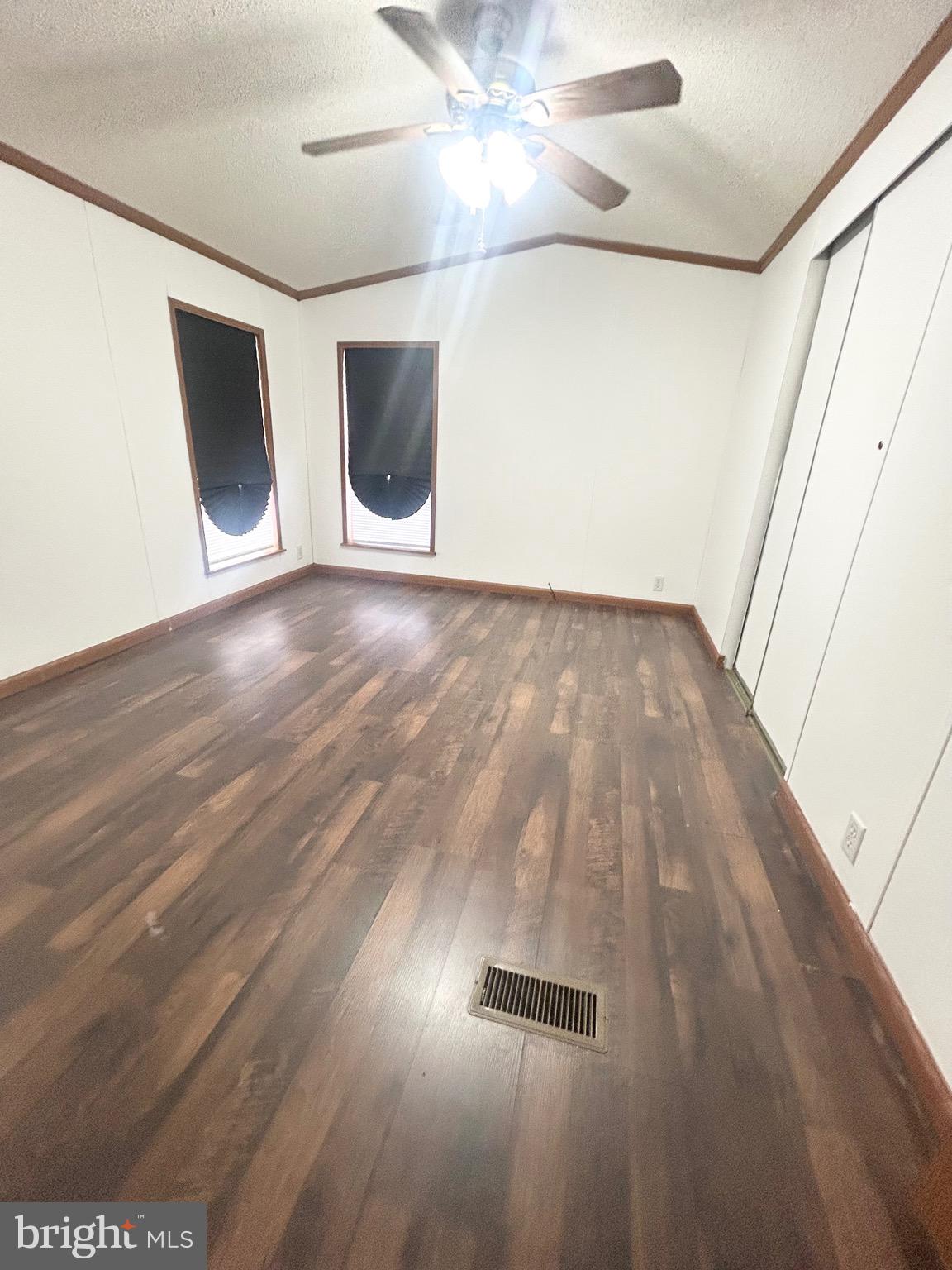 1079 Sage Avenue Reading, PA 19605 - Photo 8 of 12 a view of an empty room with wooden floor