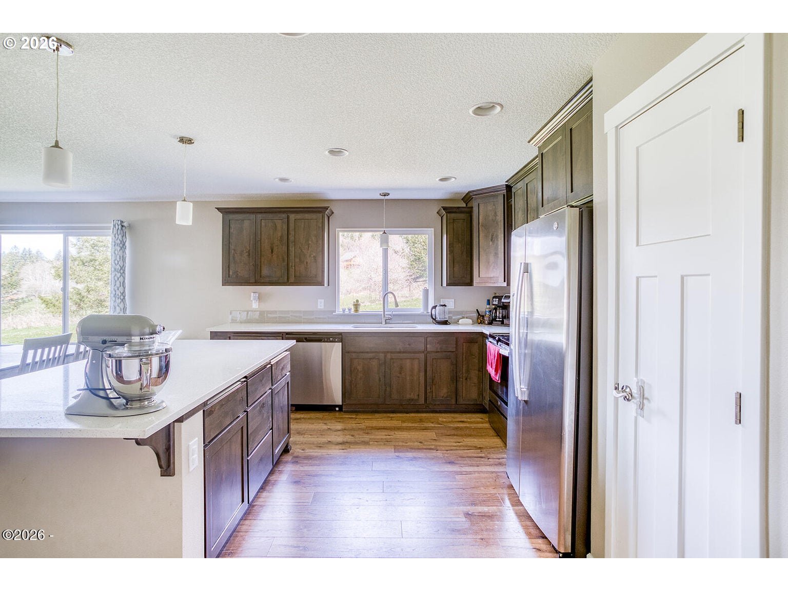 33803 Highway 22 Hebo, OR 97122 - Photo 14 of 40 a kitchen with stainless steel appliances granite countertop a sink stove and refrigerator