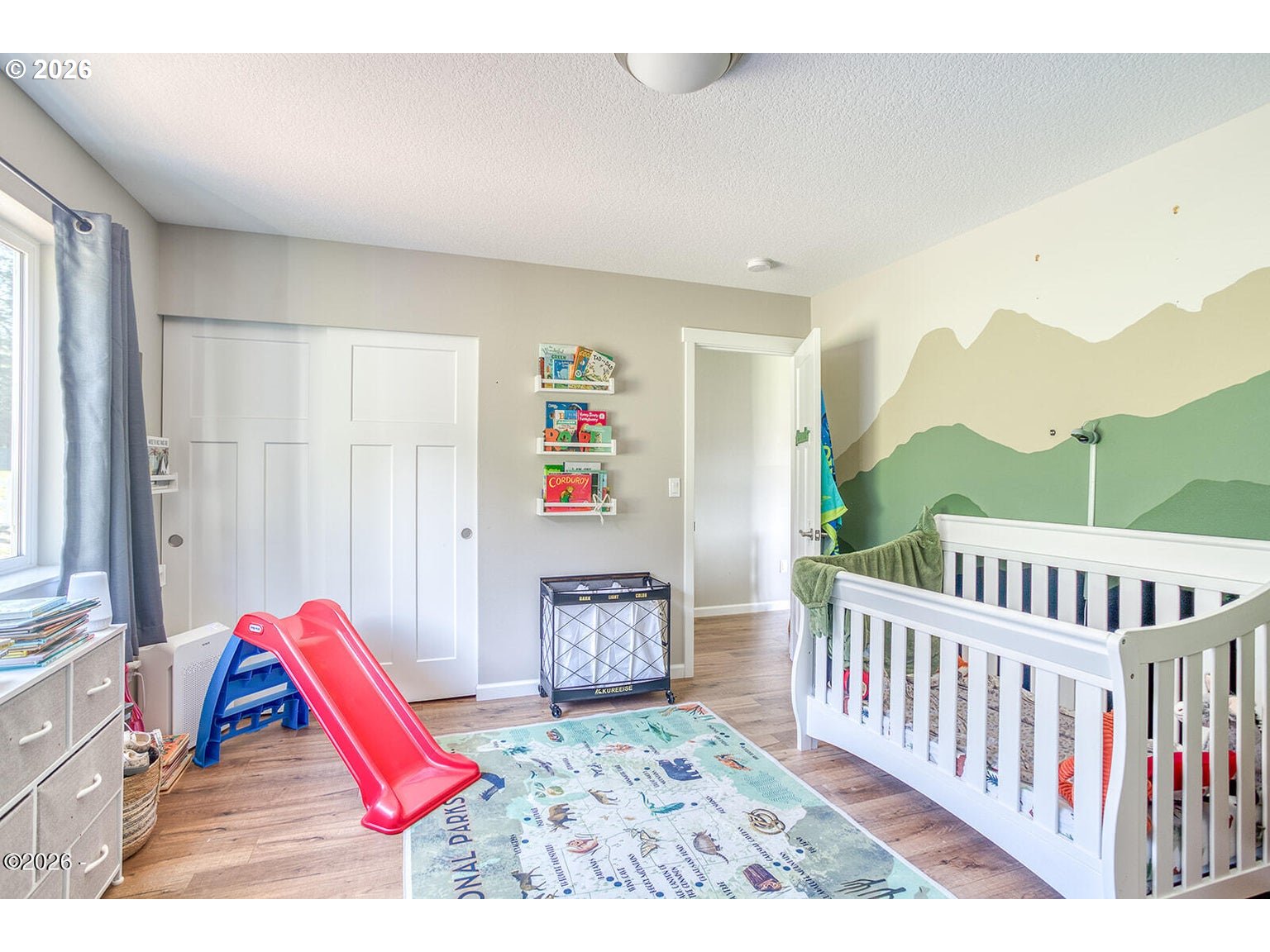33803 Highway 22 Hebo, OR 97122 - Photo 22 of 40 a view of a bedroom with baby crib and windows