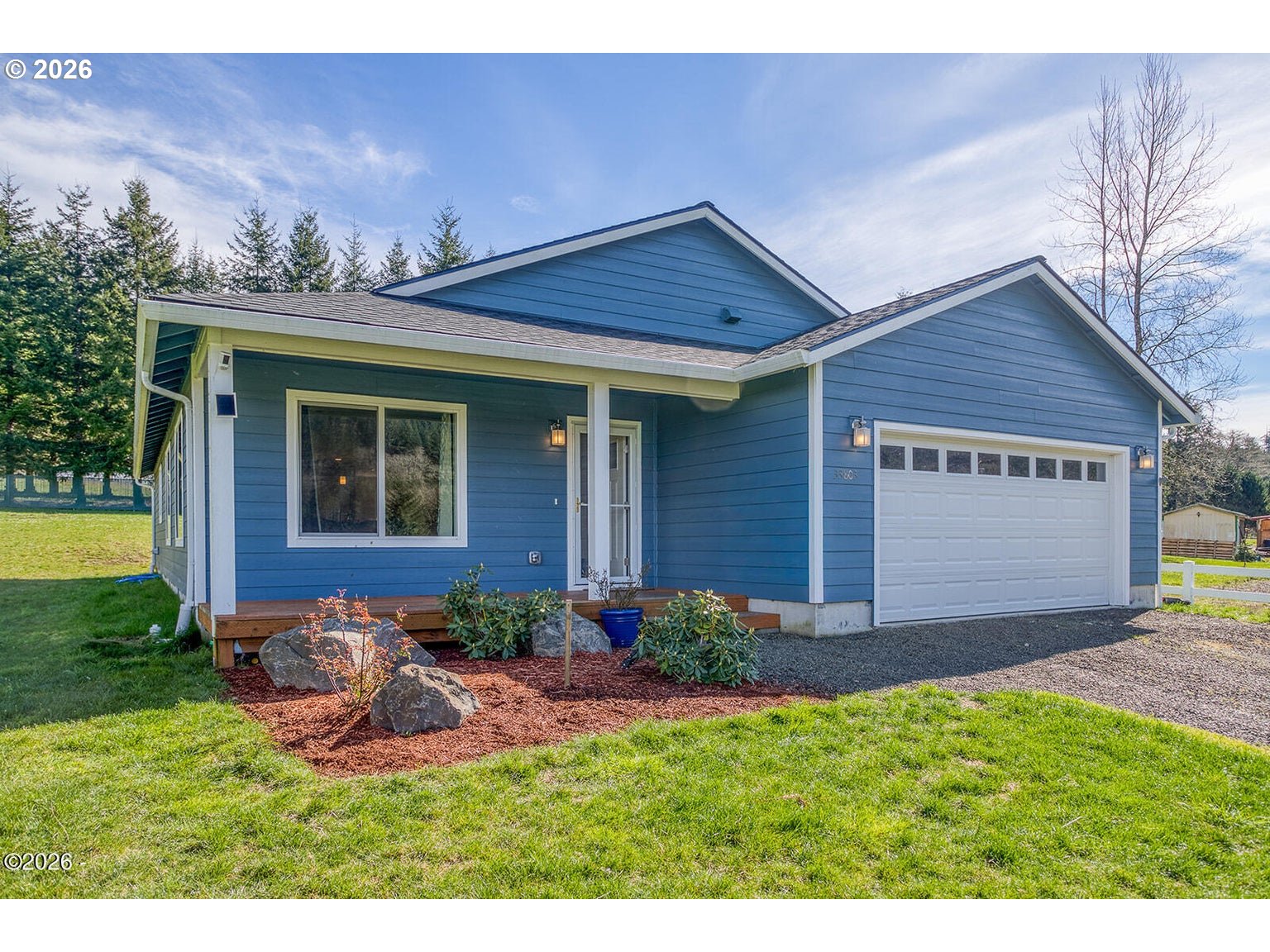 33803 Highway 22 Hebo, OR 97122 - Photo 3 of 40 a view of a house with backyard and garden