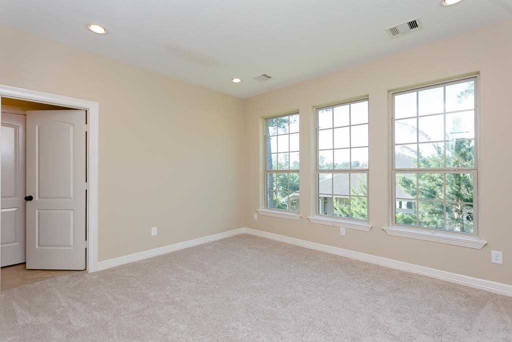 8403 Oak Knot Drive Spring, TX 77389 - Photo 18 of 31 an empty room with windows and closet
