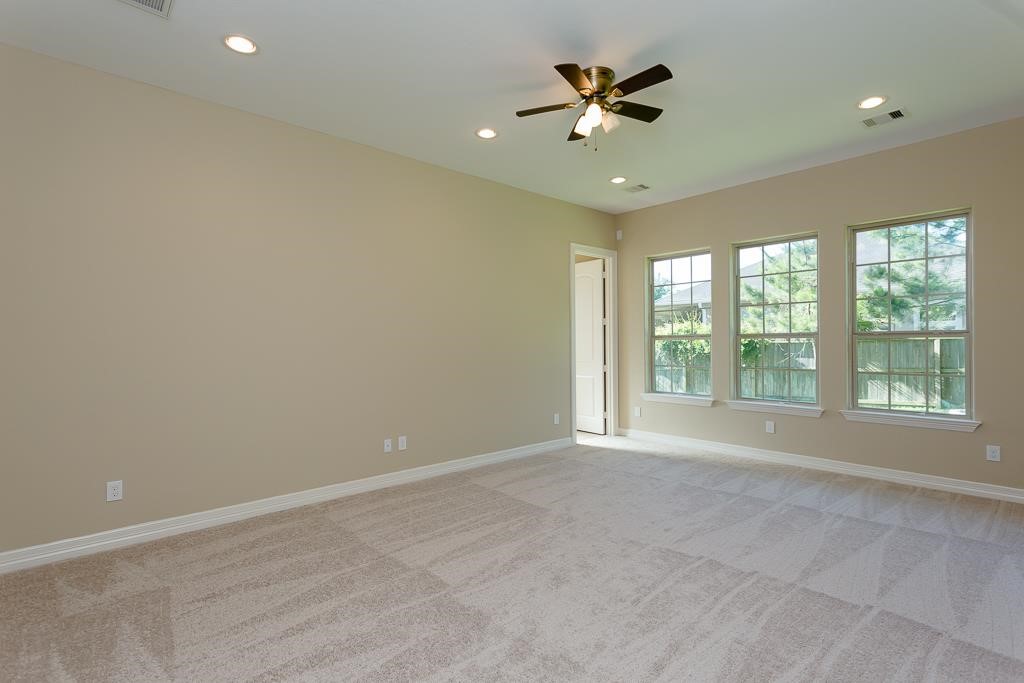 8403 Oak Knot Drive Spring, TX 77389 - Photo 20 of 31 a view of an empty room with a window