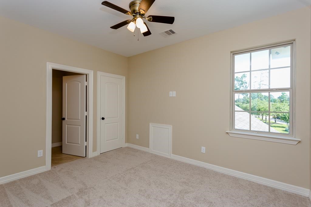 8403 Oak Knot Drive Spring, TX 77389 - Photo 23 of 31 a view of an empty room with a window