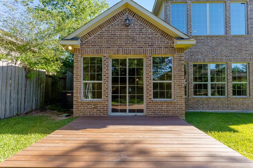 8403 Oak Knot Drive Spring, TX 77389 - Photo 28 of 31 a front view of a house with a yard