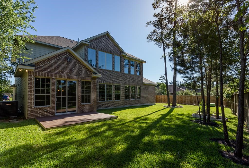 8403 Oak Knot Drive Spring, TX 77389 - Photo 29 of 31 a view of a house with a yard and tree s