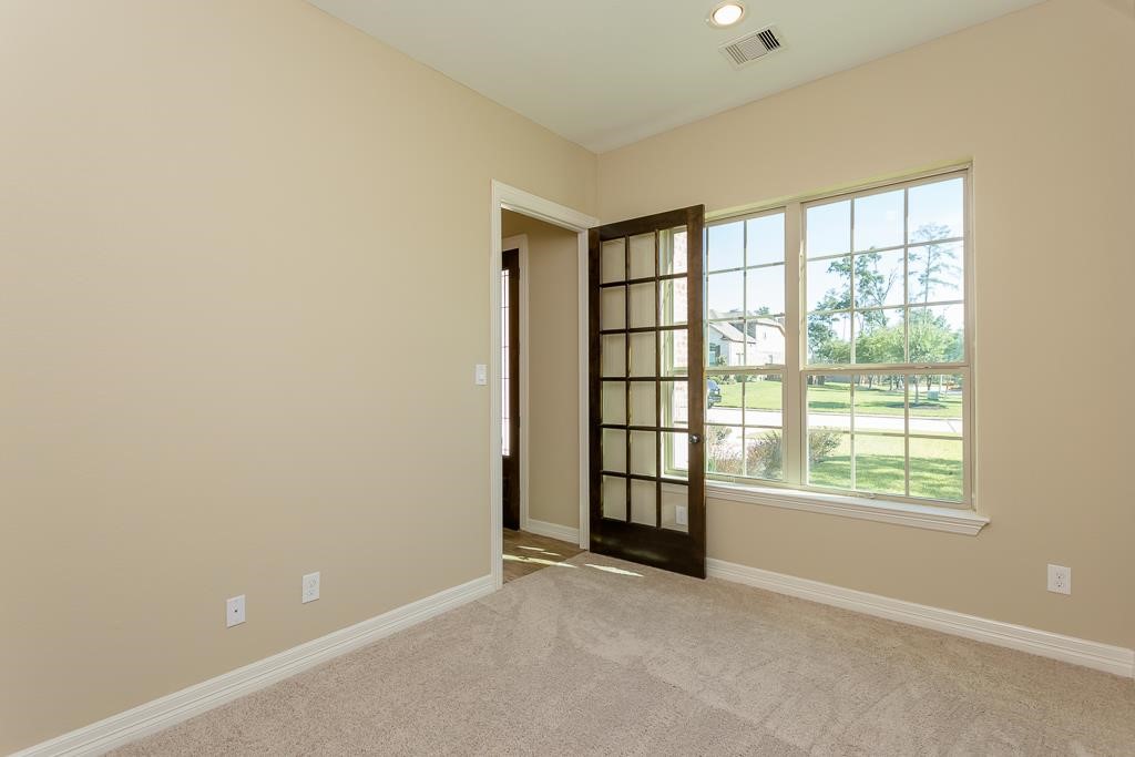8403 Oak Knot Drive Spring, TX 77389 - Photo 5 of 31 an empty room with windows
