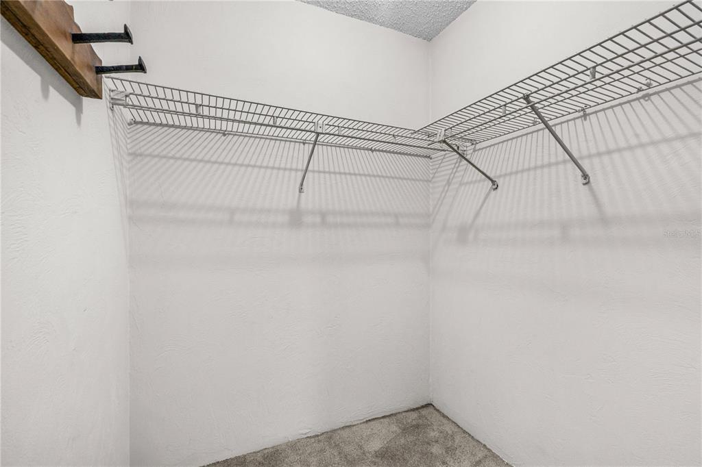 693 Reillys Road Port Orange, FL 32127 - Photo 21 of 31 a view of a room with racks on the wall