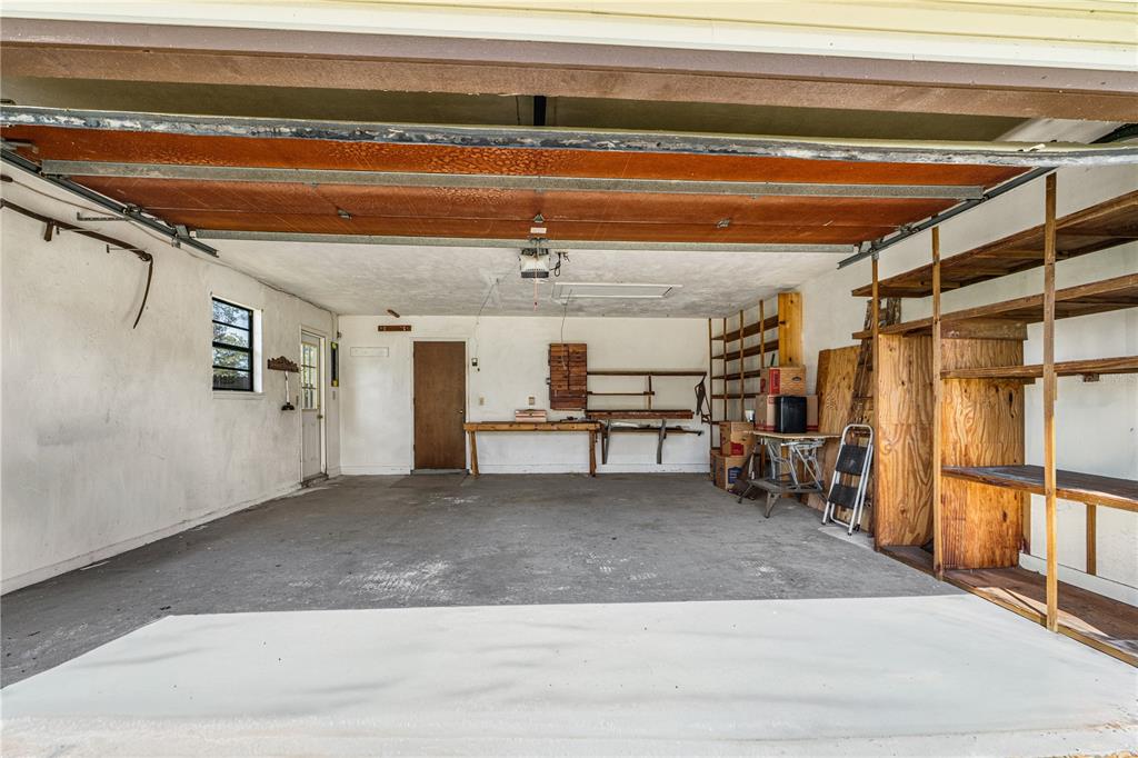 693 Reillys Road Port Orange, FL 32127 - Photo 28 of 31 a view of a room with wooden floor