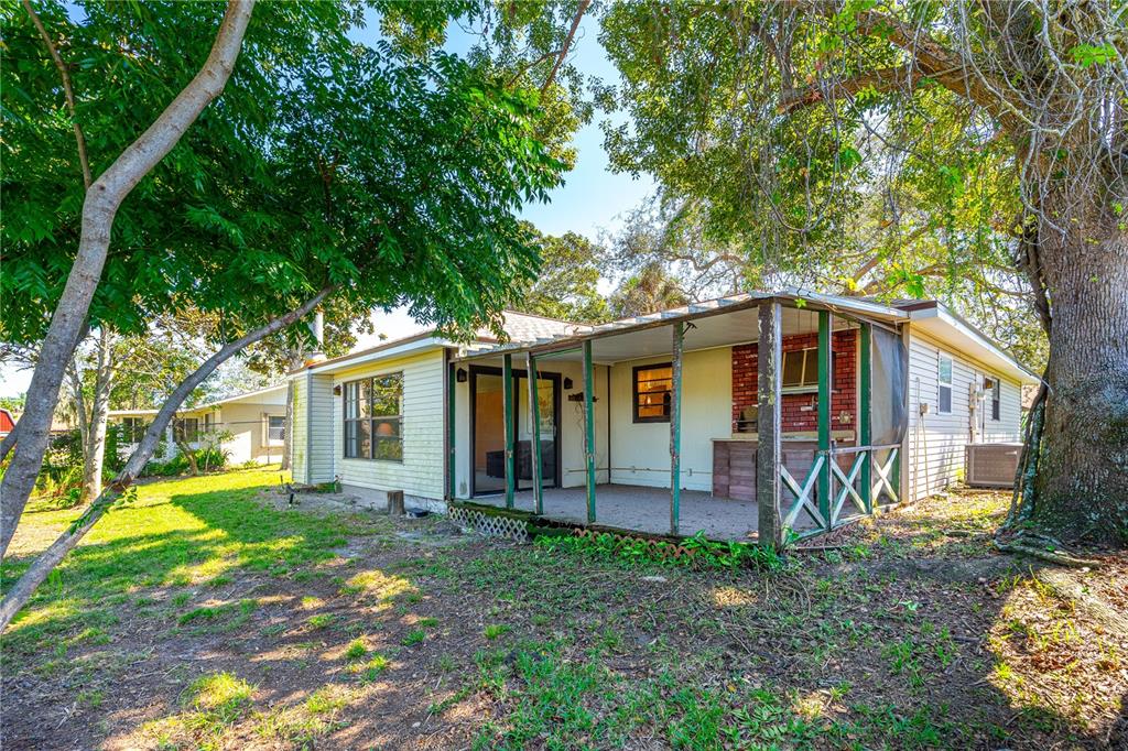 693 Reillys Road Port Orange, FL 32127 - Photo 6 of 31 a view of a house with a yard