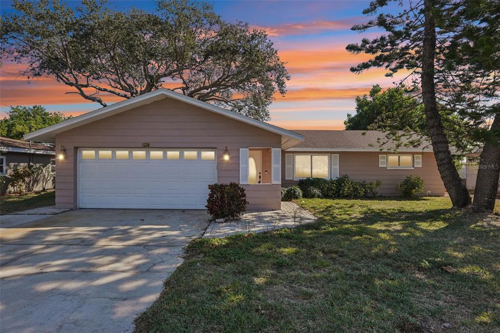 1975 Temple Terrace Clearwater, FL 33764 - Photo 68 of 69 a view of a house with a yard