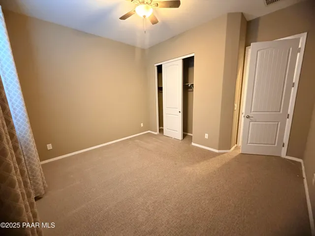 an empty room with a bathroom