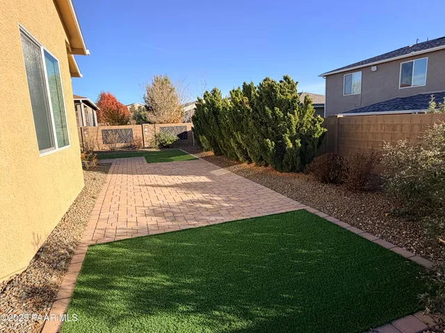 a view of a back yard of the house