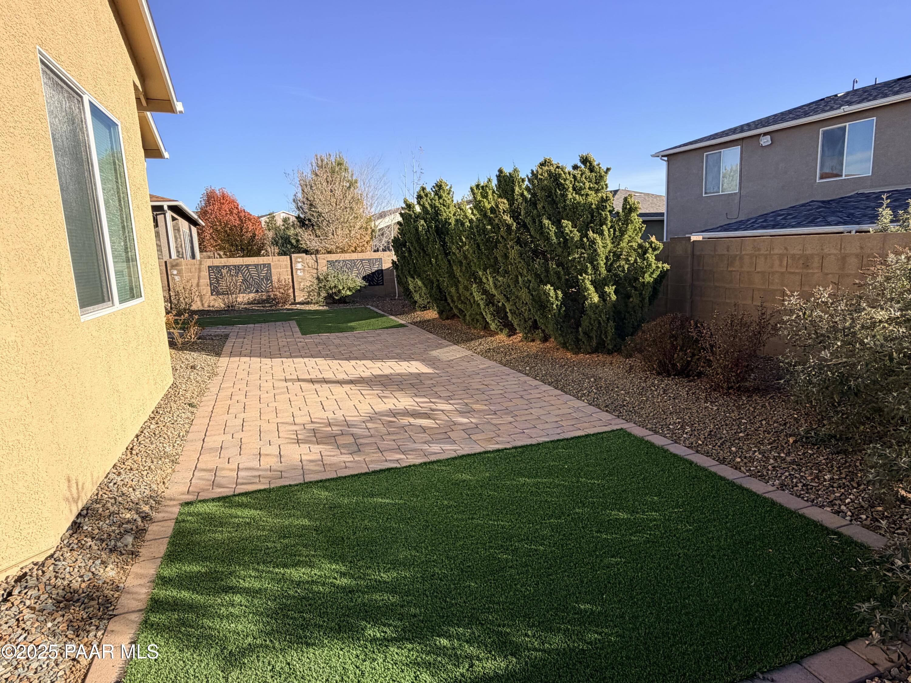 12937 East Sandoval Street Dewey, AZ 86327 - Photo 24 of 27 a view of a back yard of the house