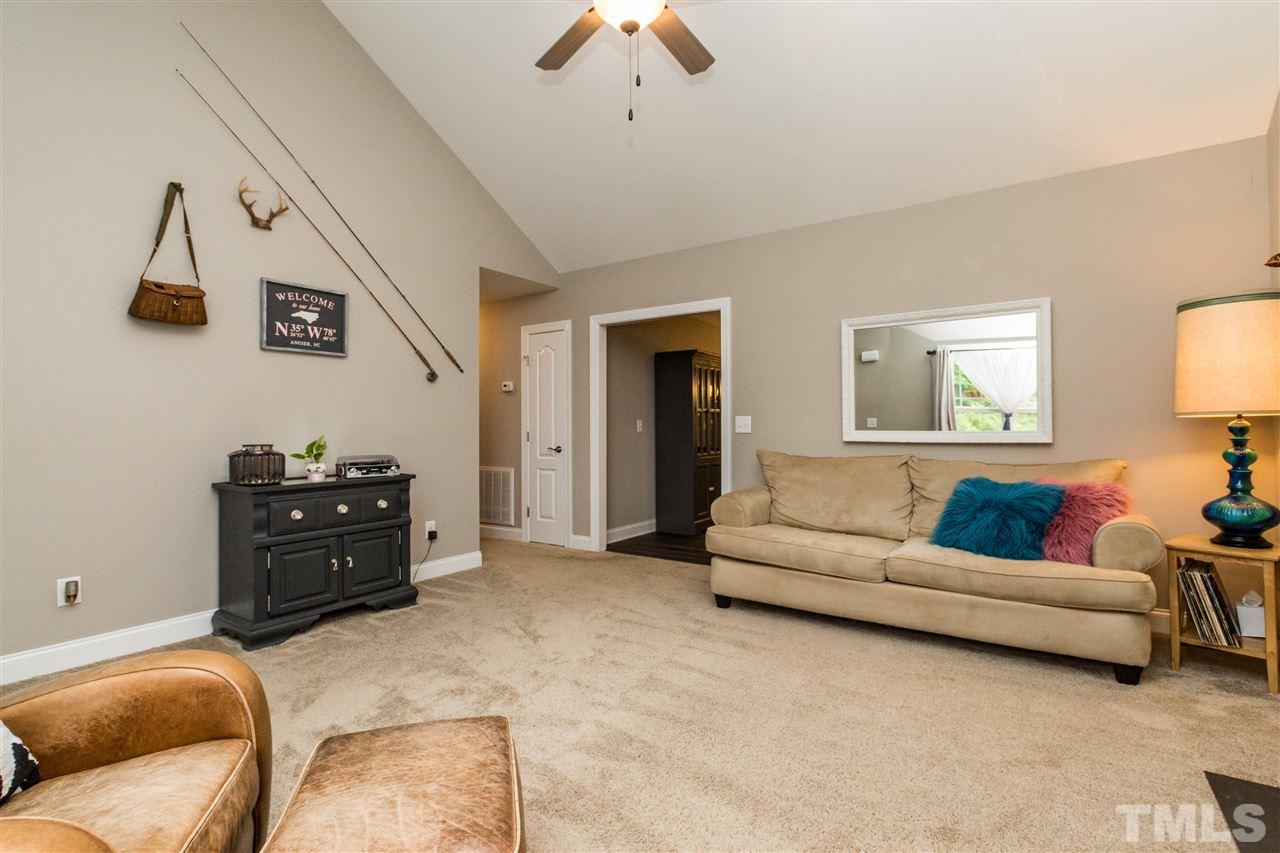 44 Henry Rifle Lane Angier, NC 27501 - Photo 6 of 22 a living room with furniture and a couch