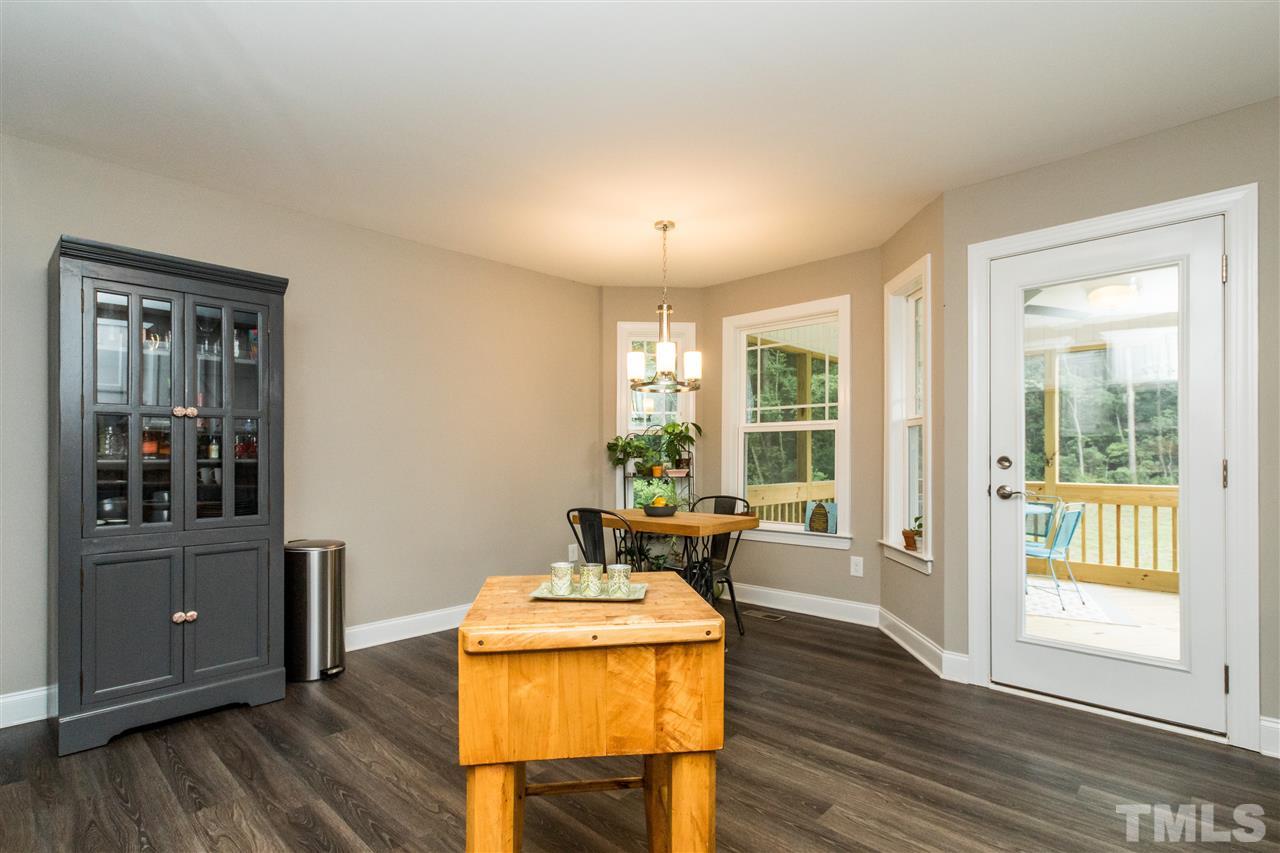 44 Henry Rifle Lane Angier, NC 27501 - Photo 10 of 22 a dining room with furniture and wooden floor