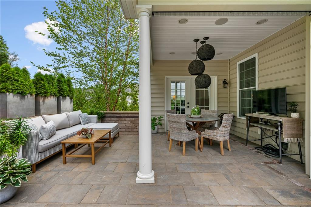 107 Resolution Drive Mars, PA 16046 - Photo 14 of 44 a view of a patio with chairs and a potted plant