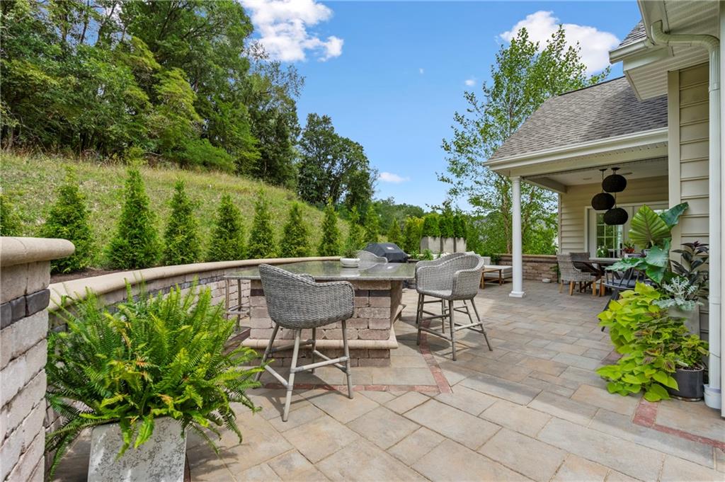 107 Resolution Drive Mars, PA 16046 - Photo 16 of 44 a view of a patio with couple of chairs and a table