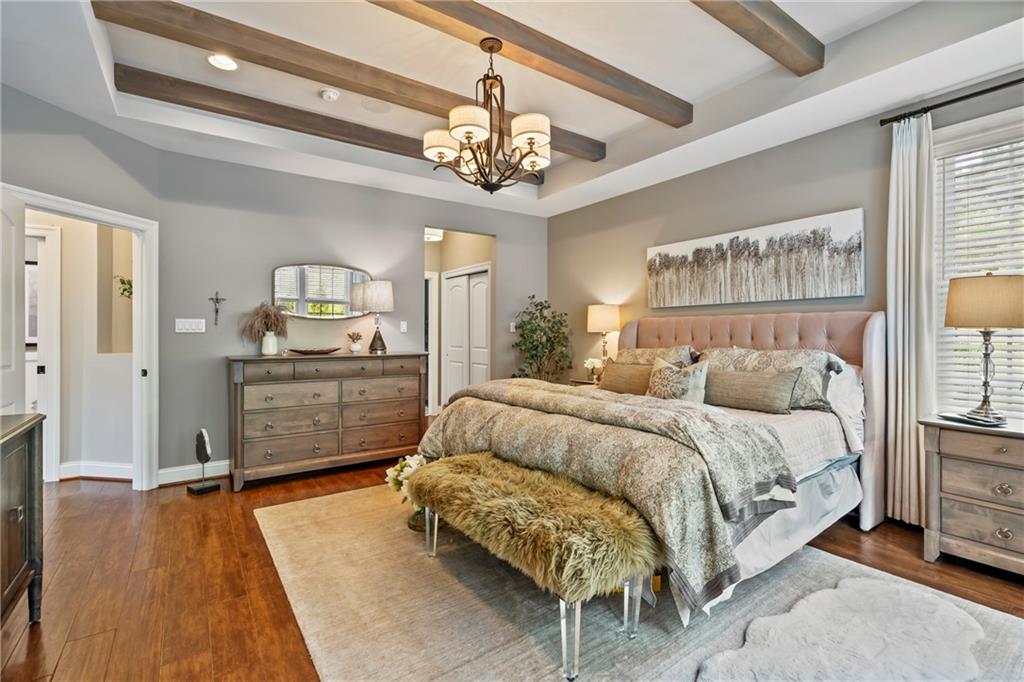 107 Resolution Drive Mars, PA 16046 - Photo 19 of 44 a bed room with a bed and a chandelier