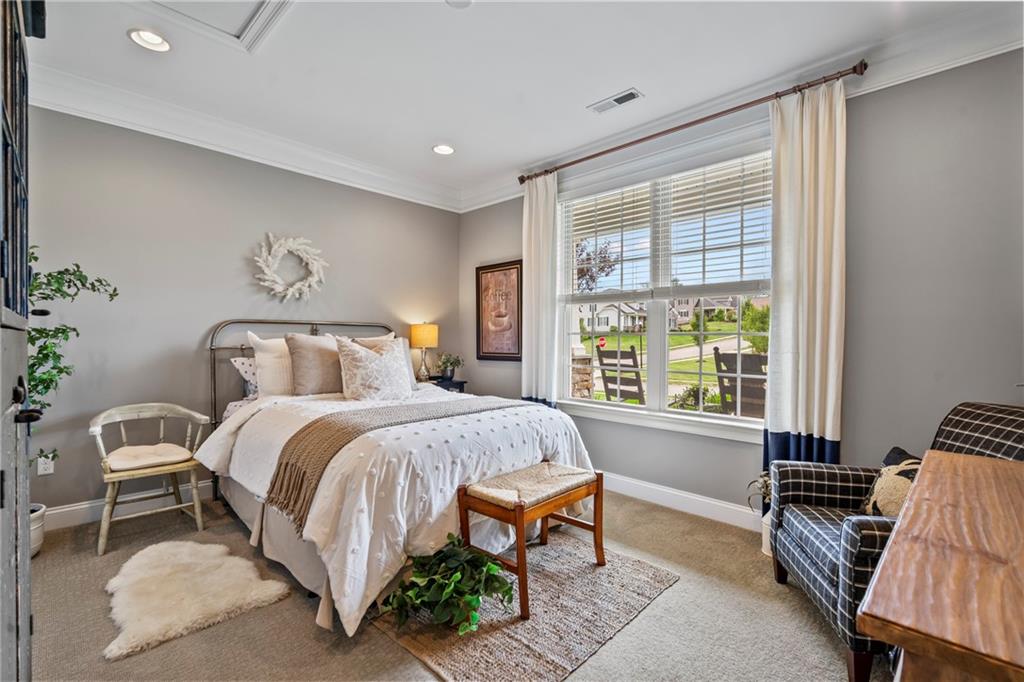 107 Resolution Drive Mars, PA 16046 - Photo 22 of 44 a spacious bedroom with a bed and a window