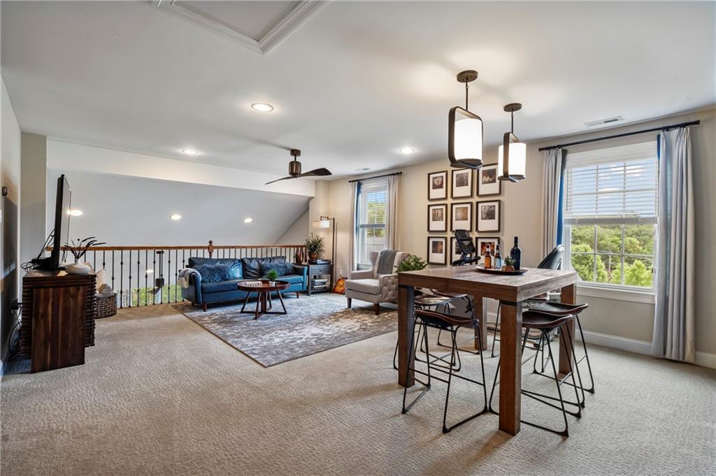 107 Resolution Drive Mars, PA 16046 - Photo 27 of 44 a dinning area with furniture and a large window