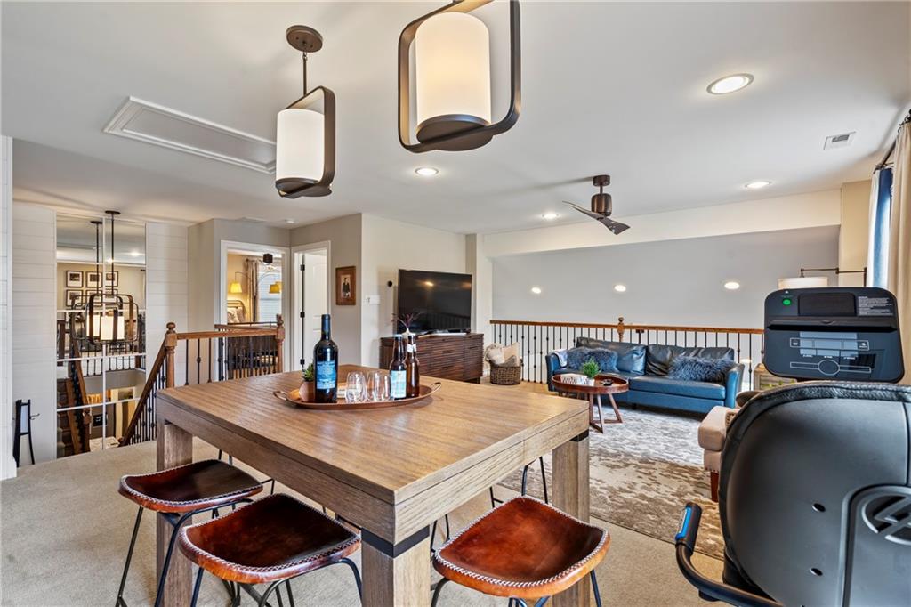 107 Resolution Drive Mars, PA 16046 - Photo 28 of 44 a view of a dining room with furniture and wooden floor