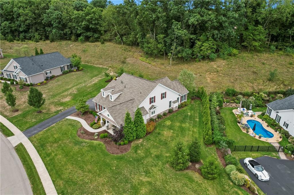 107 Resolution Drive Mars, PA 16046 - Photo 35 of 44 an aerial view of a house with a garden