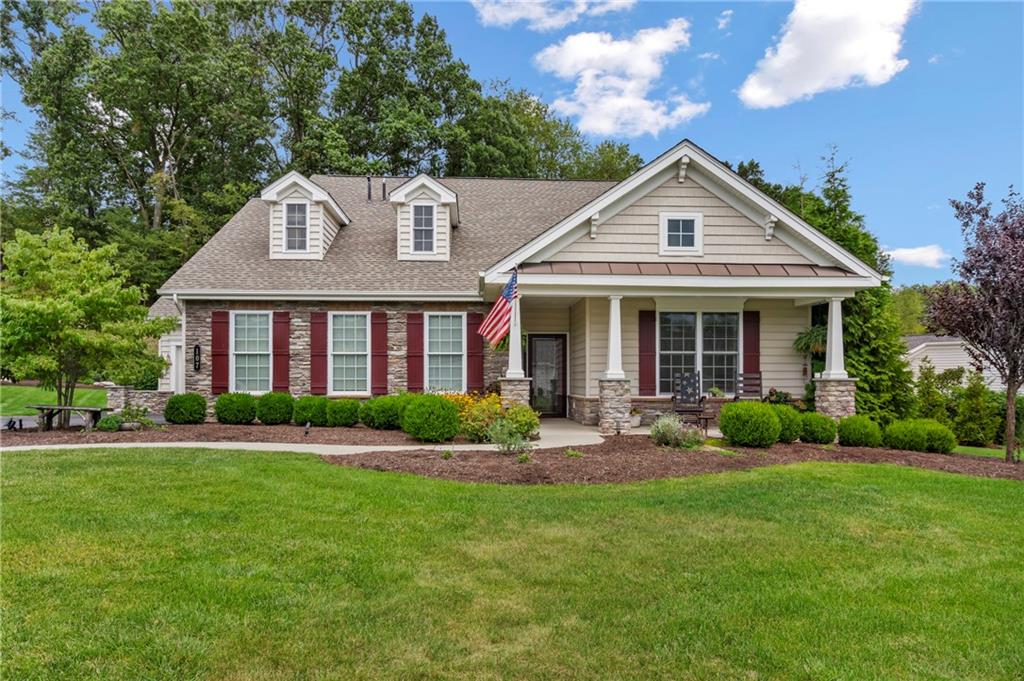107 Resolution Drive Mars, PA 16046 - Photo 38 of 44 a front view of a house with a yard and porch