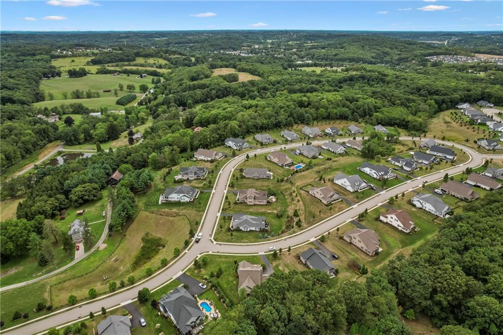 107 Resolution Drive Mars, PA 16046 - Photo 40 of 44 an aerial view of a residential houses with a lush green forest