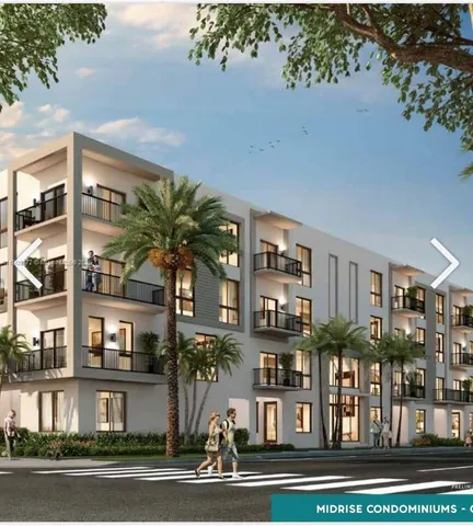 a front view of a building and a yard