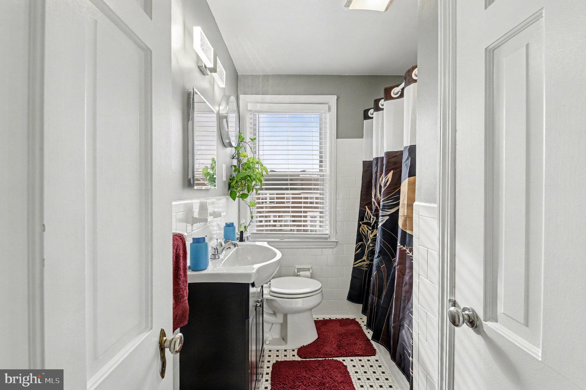 1510 Medford Road Baltimore, MD 21218 - Photo 20 of 30 a bathroom with a sink and a toilet