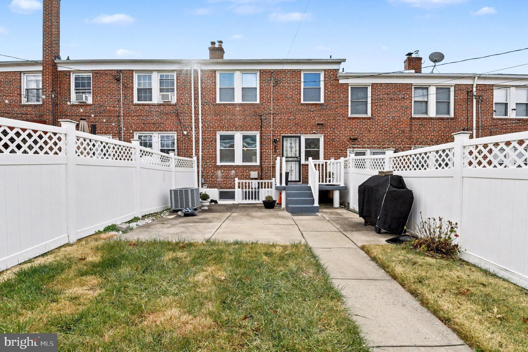 1510 Medford Road Baltimore, MD 21218 - Photo 26 of 30 a front view of a house with a yard