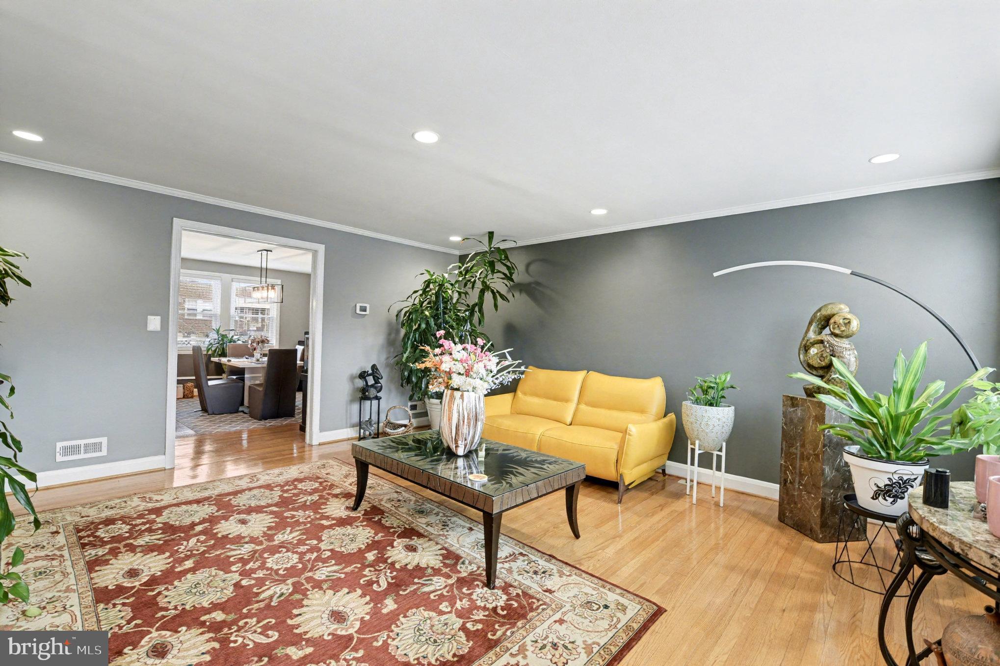 1510 Medford Road Baltimore, MD 21218 - Photo 5 of 30 a living room with furniture and potted plant