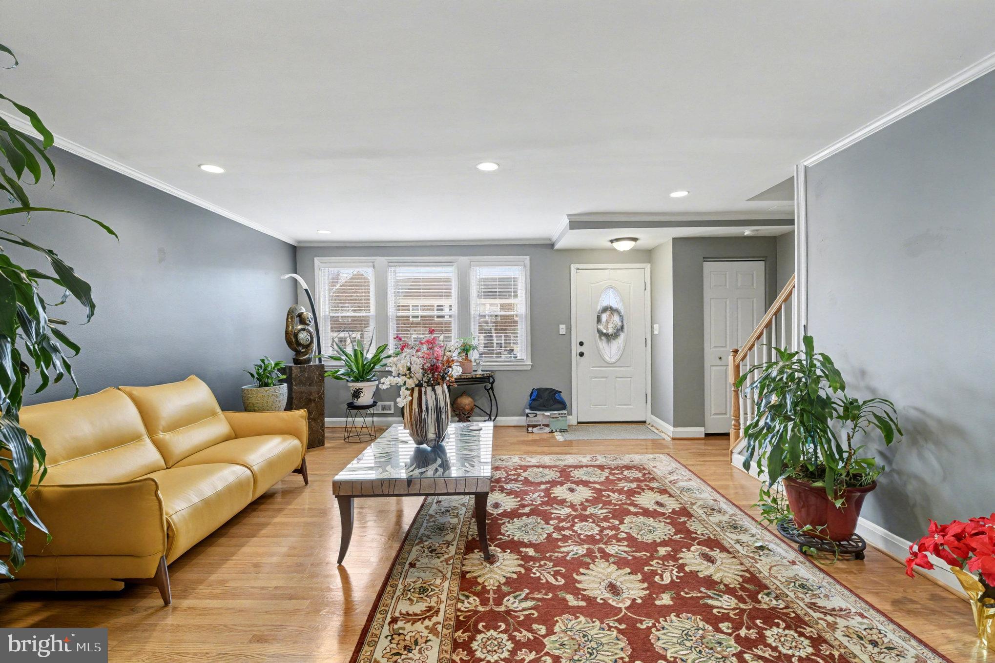 1510 Medford Road Baltimore, MD 21218 - Photo 6 of 30 a living room with furniture plant and a potted plant