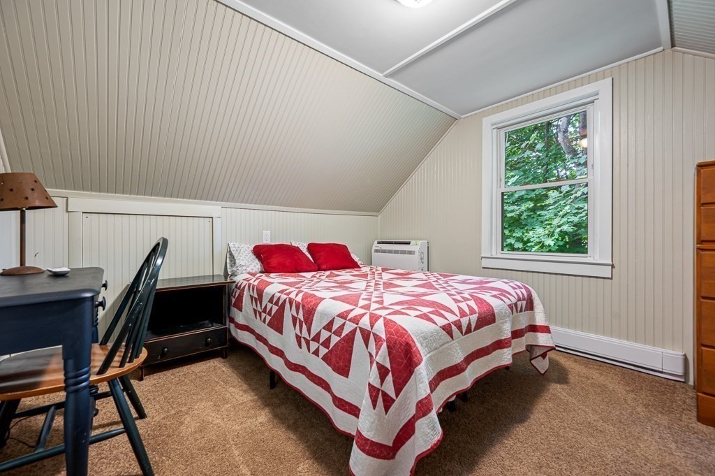 5 Colonial Drive Leicester, MA 01611 - Photo 16 of 24 a bedroom with a bed and a window