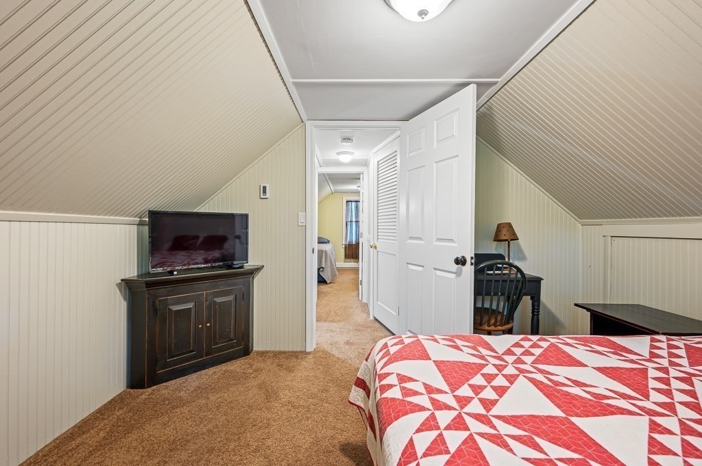 5 Colonial Drive Leicester, MA 01611 - Photo 17 of 24 a bedroom with a bed and a television