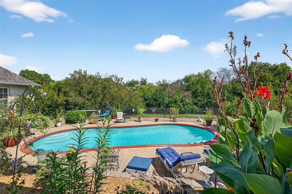 202 Hillside Lindsay, TX 76250 - Photo 28 of 37 a view of swimming pool with seating area