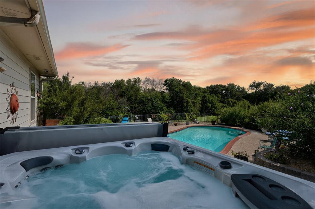 202 Hillside Lindsay, TX 76250 - Photo 4 of 37 a view of outdoor space and swimming pool