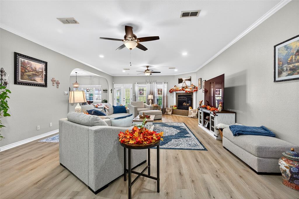 202 Hillside Lindsay, TX 76250 - Photo 5 of 37 a living room with furniture and a flat screen tv