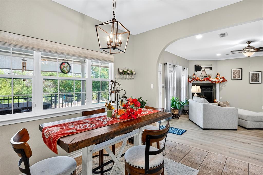 202 Hillside Lindsay, TX 76250 - Photo 9 of 37 a outdoor dining room with furniture a chandelier and wooden floor